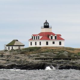 small tower near a body of water