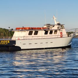 a small boat in a large body of water