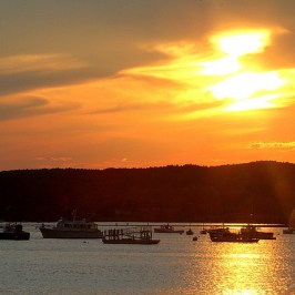 a sunset over a body of water