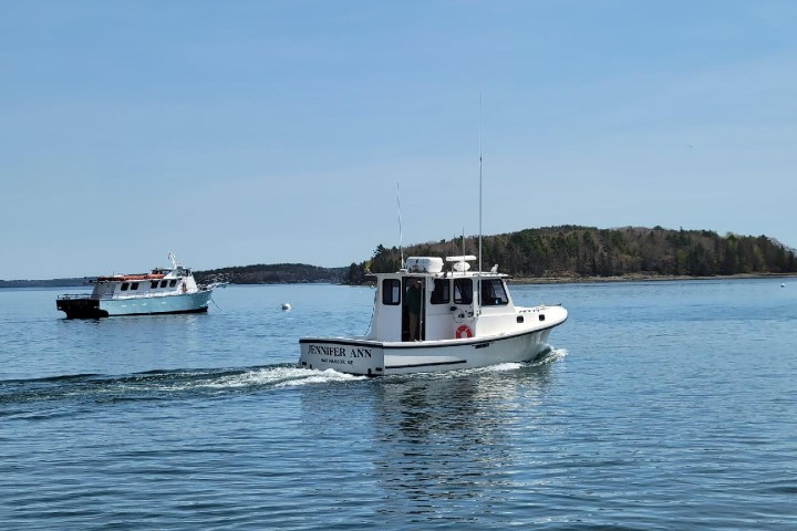 a small boat in a body of water
